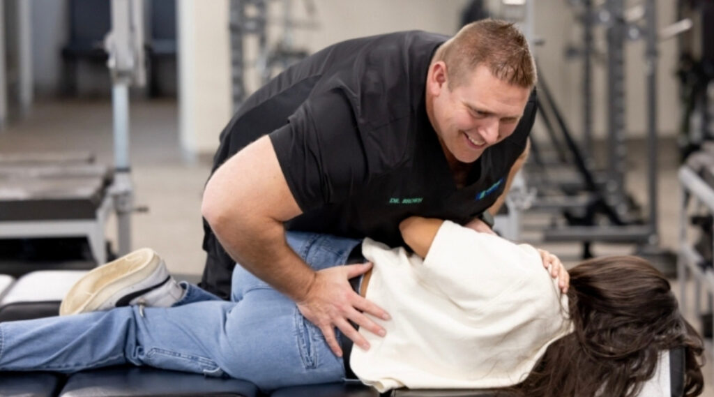 Doctor performing chiropractic care on a patient